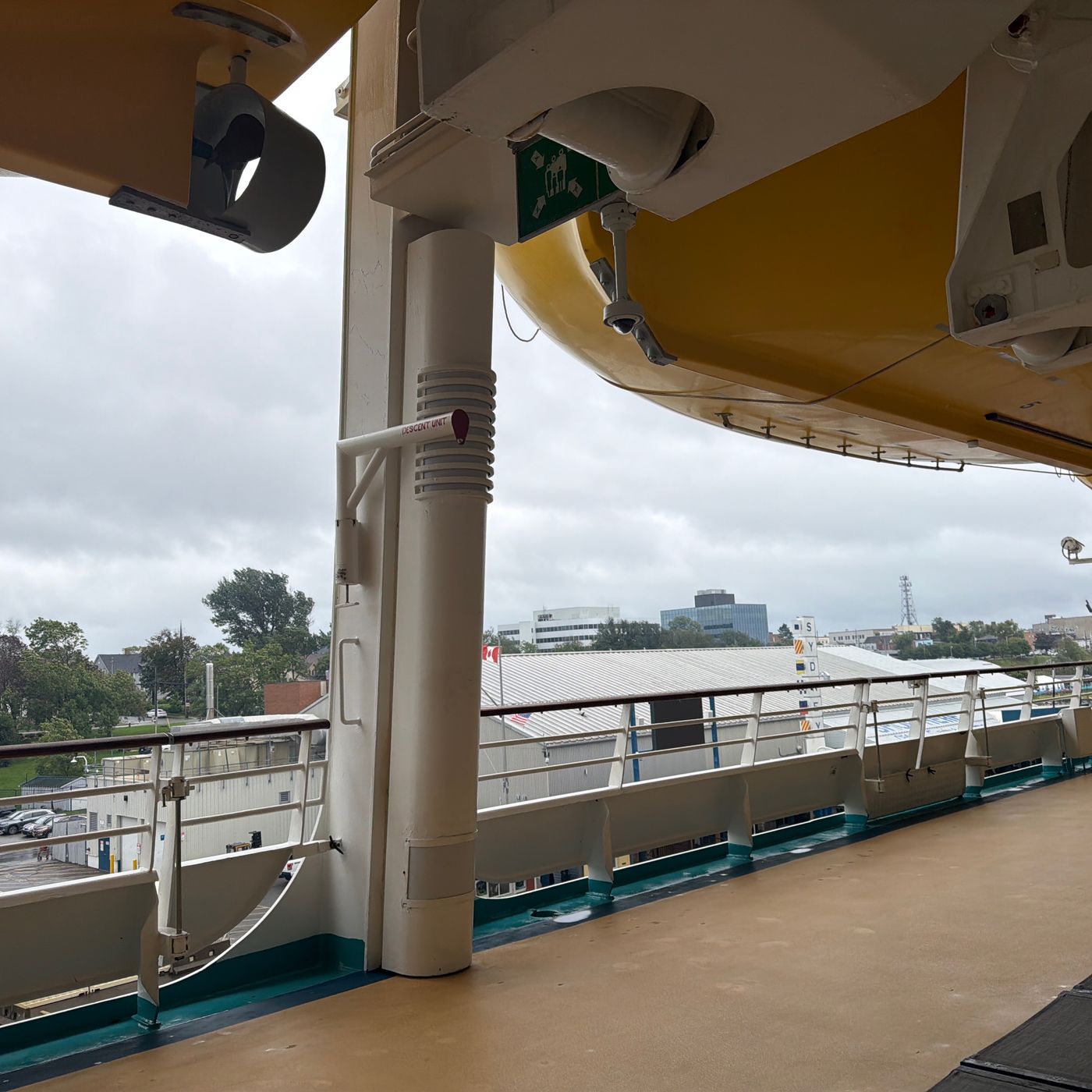 Sydney cruise terminal seen from beneath a ship’s lifeboat